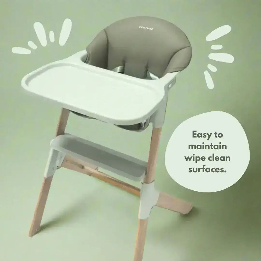 High chair with a green background and text indicating ease of maintenance.