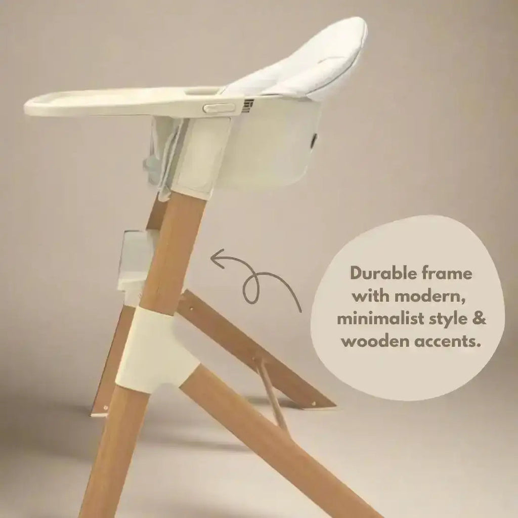 Wooden high chair with white seat on a beige background