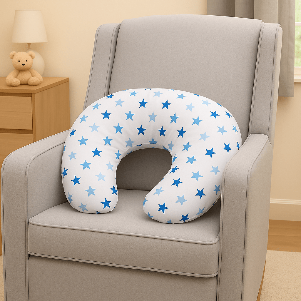 U-shaped pillow with star pattern on a gray chair in a room setting.
